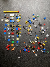 Assorted LEGO minifigure sets, various complete figures, accessories and parts