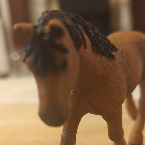 Brown plastic horse figurine - brown,