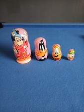 A Retro Disney Mickey Mouse And Friends wooden Russian Nesting Doll.