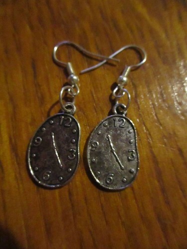 Silver tone melted clock - silver,