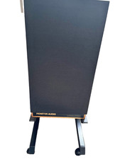 Monitor Audio freestanding speakers  on angled stand 