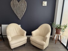 A Pair of Natuzzi Leather Arm