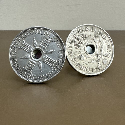 1945 new guinea shilling - new,