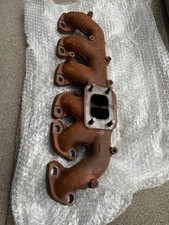 Nissan RB25det original cast exhaust turbo manifold - turbo studs in place