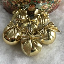 Unusual gold bow plastic - unusual,