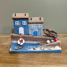 Wooden coastal village scene - wooden,
