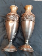 2 x Vintage copper or bronze vases with an embossed floral design. 8.5in high