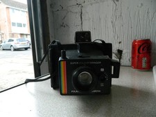 vintage Polaroid super color swinger land camera
