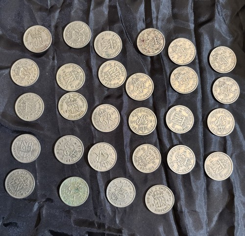 British sixpence coins - 27,