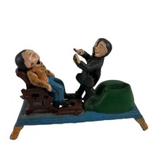 Vintage Cast Iron The Dentist