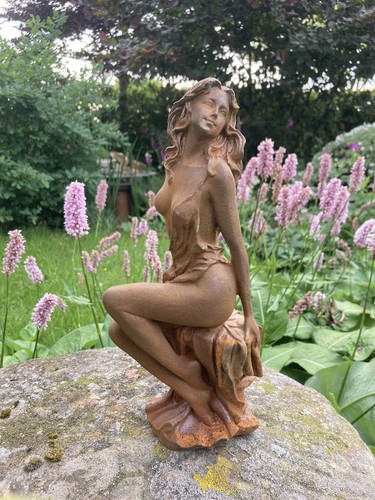 Metal rusty cast iron sitting - rusty,