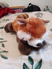 RAVENSDEN PLUSH RACCOON LAYING