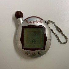 Tamagotchi Connection V4 Silver / Dk Red (Chocolate?) +  Instructions - Working