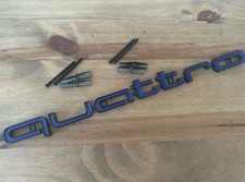 Blue And Black Quattro Badge