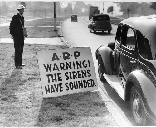 Air raid warden with - air, a
