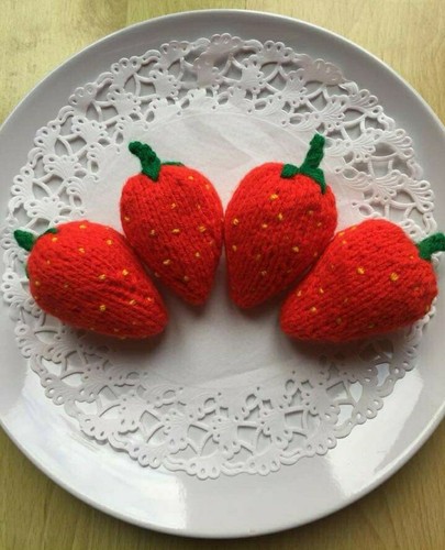 Hand knitted strawberries - hand,