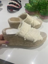 WEDGE-HEELED ESPADRILLES