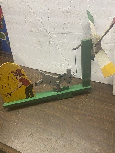 Vintage donkey kicking farmer - donkey,