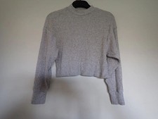 Girls Stone coloured long sleeved crop top. Size 9-10 years