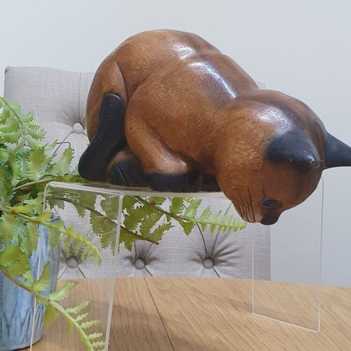 Hand carved wooden curious - carved,