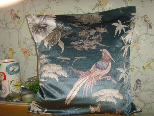 Made teal oriental bird - in,