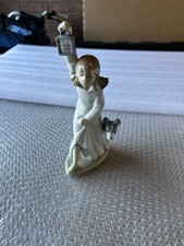 NAO Girl Holding Lamp with Dog
