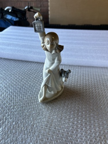 Nao girl holding lamp with - with, dog