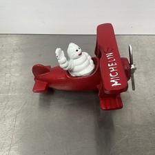 Vintage Cast Iron Michelin Man Biplane Figurine – Retro Decor