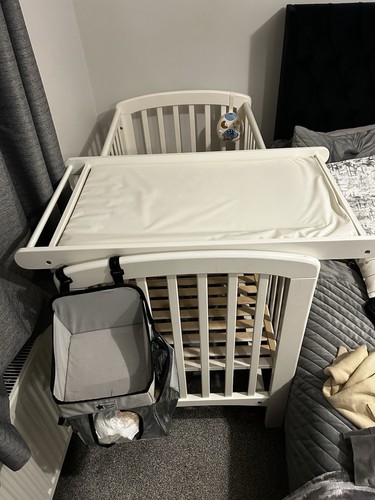 Adjustable bed side baby cot - side,