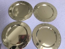 Four Gold Coloured Chargers / Place Settings / Servers