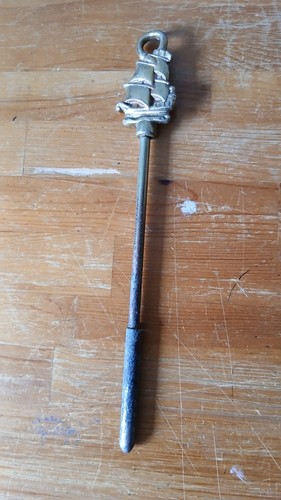 Vintage brass ship - fire, poker