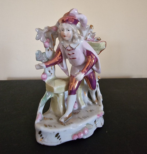 Porcelain page figurine from