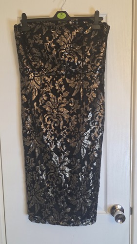 Next black and gold - black,