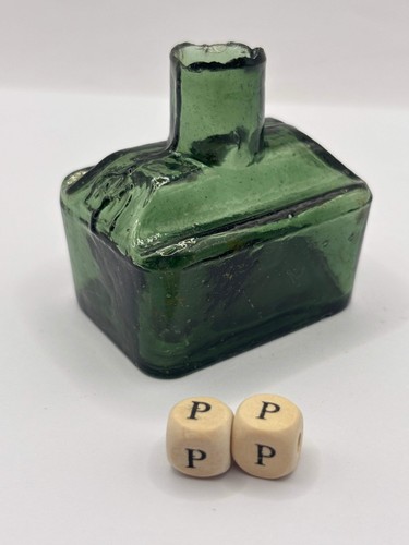 Old green glass boat ink