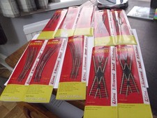 Collection of Hornby OO gauge packaged points crossings and isolating tracks
