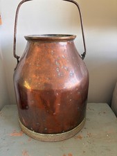 Vintage copper milk churn with