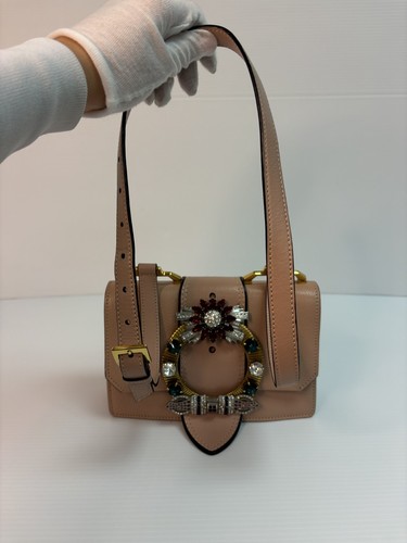 100 authentic miu - miu,