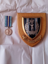 Royal Observer Corps Medal named to Observer G W Thurman and wall plaque shield