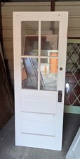 EXTERIOR WOOD DOOR 4 PANES OF