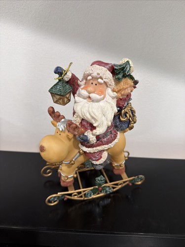 Santa rocking reindeer - on,