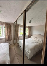 Used Floor to ceiling sliding wardrobe doors x 4 light oak effect