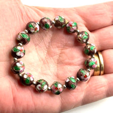 Cloisonne bead bracelet hand
