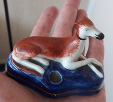 STAFFORDSHIRE GREYHOUND PEN HOLDER GREYHOUND POTTERY ORNAMENT