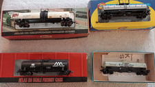 4 ASSORTED HO GAUGE TANK CARS: ATHEARN AND ATLAS