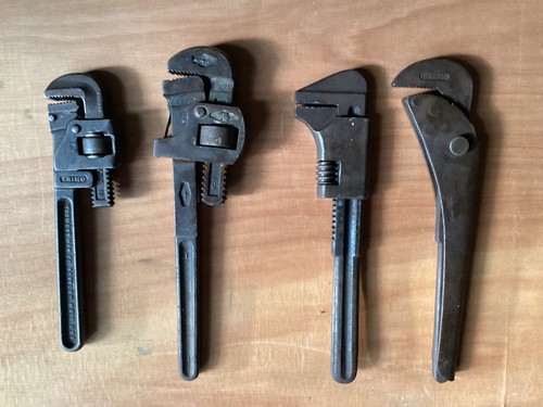Pipe wrench grips gas - pipe, water