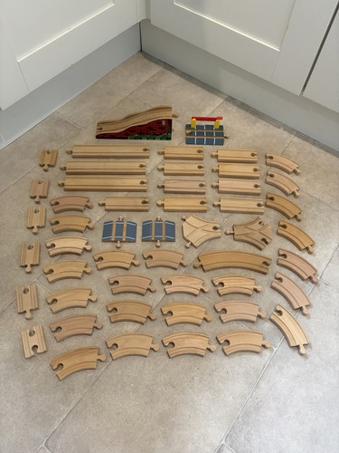 Wooden train track pieces - train,