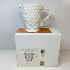 Neisha Crosland Paper Clip