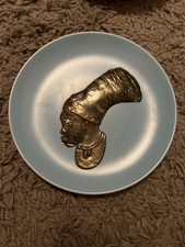 A vintage Poole Pottery wall