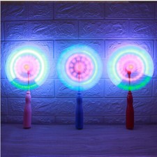 4PCS Flashing Light Up LED Spinning Windmill Glows Child Toys Music Present Gift