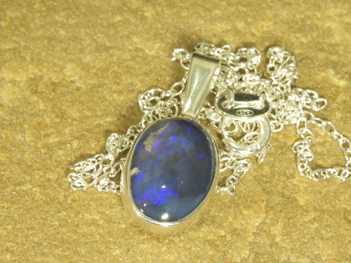 Black solid 4ct opal - 2.4ct,